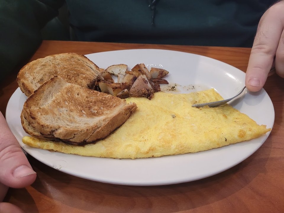 Cheese Omelette Home Fries and Rye Toast