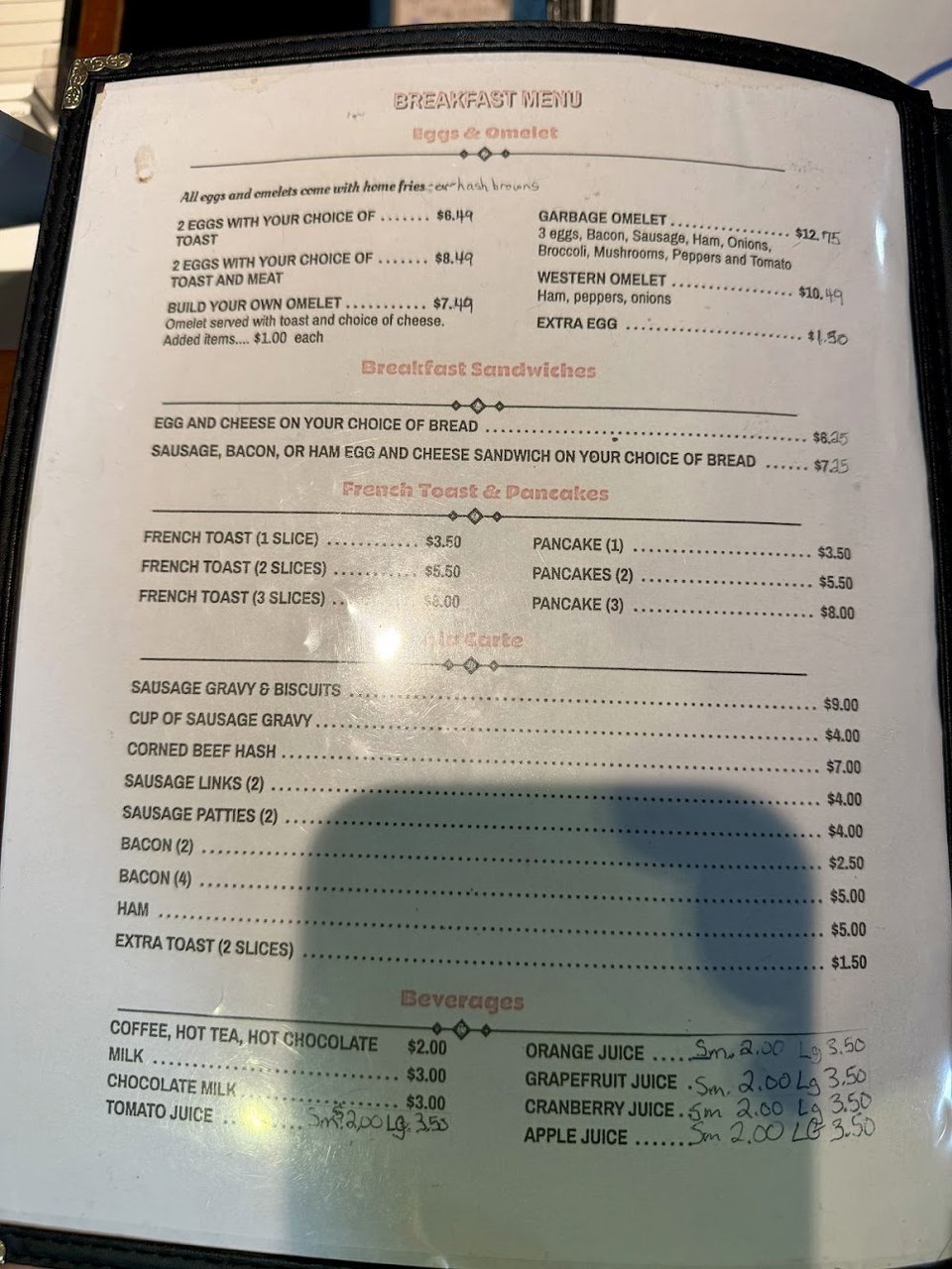 Close-up of a restaurant menu with classic comfort food.